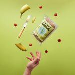 A Person Catching a Pack of Keto Bread on Air